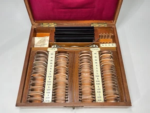 Antiguo conjunto de marcos de lentes de prueba oftálmica óptica optometrista alemán caja de madera - Imagen 1 de 13