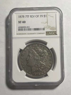 1878  7 TF  Rev. of 1879 Morgan Dollar, NGC XF40 - Image 1 of 3