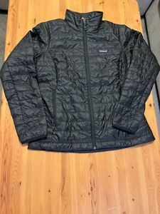 PATAGONIA Giacca Donna Nano Puff - Taglia Large - Nera - Nuova con etichette $239 - Foto 1 di 12