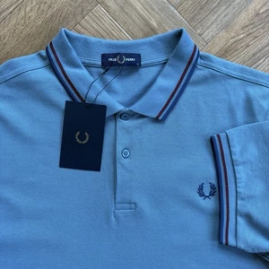 Nuevo con etiquetas Camisa Polo Fred Perry M3600 Manga Corta Doble Punta Azul Ceniza Extra Grande - Imagen 1 de 19