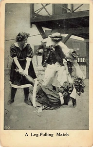Vintage Postcard - 1910 / Ladies Cat fight ? pulling legs - B & W - no stamp - Picture 1 of 2