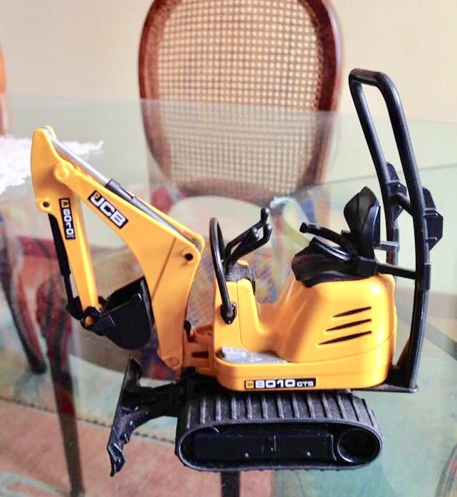 MINI ESCAVATORE CINGOLATO - BRUDER 1/16 - Immagine 1 di 1