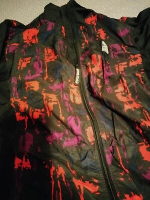 Chaqueta cortavientos Pearl Izumi para mujer 10 negra roja cremallera manga larga ciclismo  Foto 1 de 2