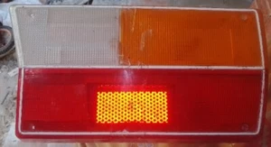 LENTE LUZ TRASERA SAAB 99 DIESTRO - Imagen 1 de 2