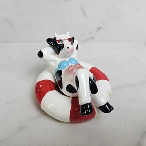 1987 Vandor Pelzman Designs Cow on Swim Float Salt & Pepper Shaker Set - Picture 1 of 9