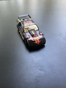 1985 Vintage Hot Wheels Flip Outs Pontiac Firebird Black Yellow Purple Orange - Picture 1 of 7