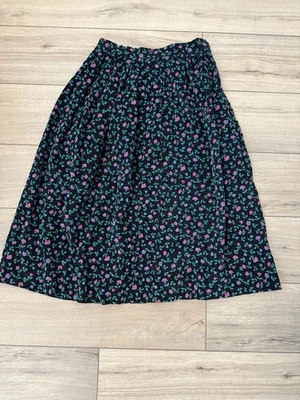 Falda vintage de pana negra con estampado floral rosa, verde y azul Foto 1 de 2