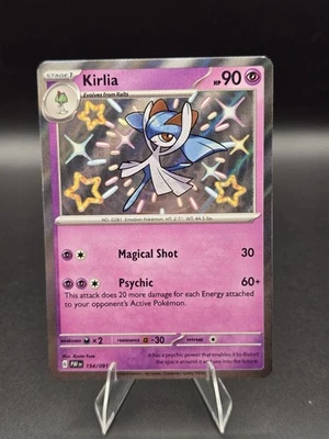 Kirlia 154/091 SV: Paldean Fates Shiney Rare Holo - Image 1 of 2