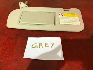 2007 MITSUBISHI GRANDIS 5DR FRONT PASSENGER SIDE LEFT SUN VISOR GREY - Picture 1 of 3
