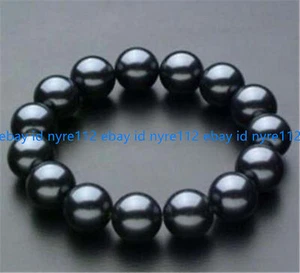 Natürliches 10 mm schwarzes Muschel Perle runde Perlen Armband 7,5" (keine echten Perlen) - Bild 1 von 12