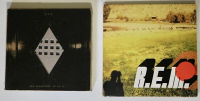 R.E.M. lot of two CD sets NEW ADVENTURES IN HI-FI REVEAL IMITATION OF LIFE  - Image 1 of 4