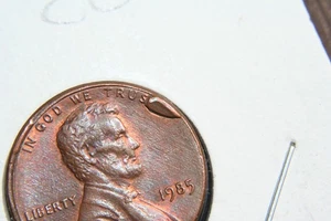1985  Lincoln Memorial Cent  CUD Error CU-1c-1985-33 & 34 Rim Cud - Picture 1 of 3