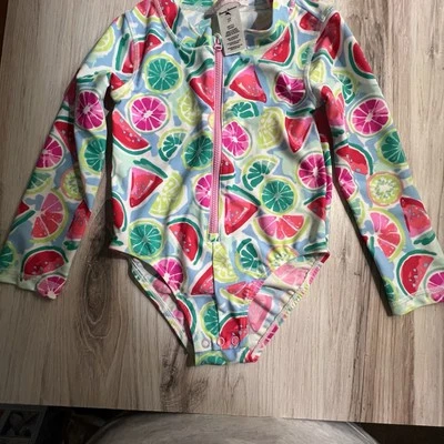 Traje de baño Tommy Bahama de una pieza para bebé niña talla 3T mezcla de frutas protector contra erupciones  Foto 1 de 4