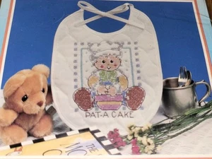 Bucilla Mother Goose Pat-a-Cake Bib Stamped Cross Stitch NEW - Picture 1 of 4