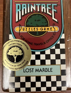 Puzzle game Raintree "Marmo perduto": giocattolo portatile in legno Mind Twister 1987 nuovo. o - Foto 1 di 2