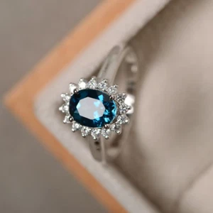 3.00 CT Oval Cut Simulated Topaz Women's Fancy Halo Ring 925 Sterling Silver - Picture 1 of 5