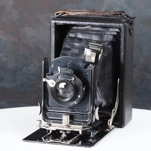 ^ Ernemann Heag I letto pieghevole fotocamera in metallo con obiettivo doppio 10,5 cm f/11 [Leggi] - Foto 1 di 7