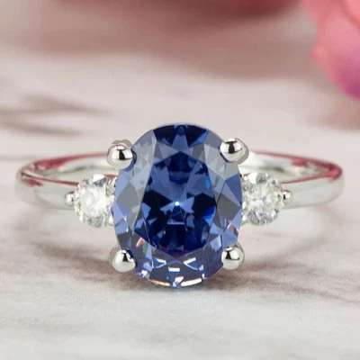 5.30 克拉椭圆形切割天然坦桑石钻石宝石戒指 950PT 镀铂 — 第 1/4 张图片