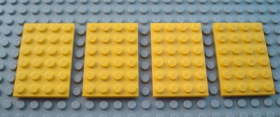 LEGO Lot of 4 Yellow 4x6 Building Flat Plate Pieces - Image 1 of 1