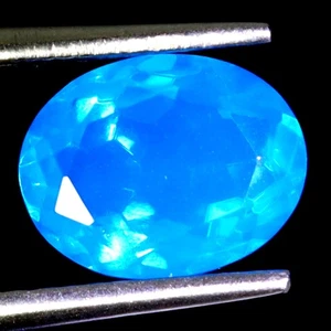 Seltener ovaler natürlicher heißer Regenbogen blauer Opal Äthiopien sauber 1,39 kt 9 x 7 mm Edelstein - Bild 1 von 14