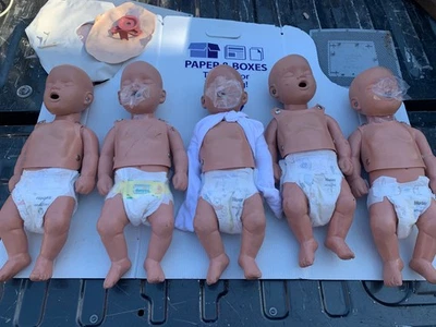 LOTE DE 5 MANIQUÍES SIMULAIDS RECIÉN NACIDOS SANI-BABY CPR Foto 1 de 2