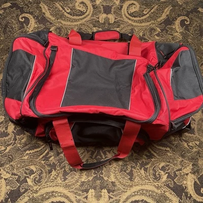 Vtg Red And Black Duffel Style Bag on Wheels Unused 28.5” x 16” x 13” - Image 1 of 4