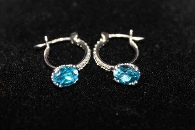 Pendientes colgantes pequeños de topacio azul de plata 925 Foto 1 de 3