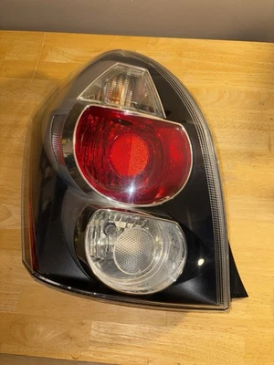 2009-2010 Pontiac Vibe Driver Side LH Side Tail Light Assembly OEM - Image 1 of 4