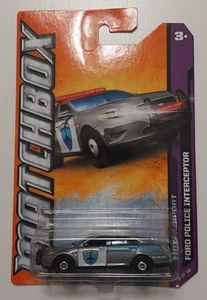 1/64 MATCHBOX: FORD POLICE INTERCEPTOR - 2012 MBX AIRPORT SERIES - Picture 1 of 2