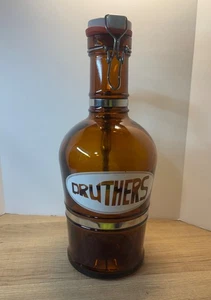 Patrón Geschutz Druthers Coleccionable Growler Vidrio Ámbar Columpio Superior 2L Capacidad - Imagen 1 de 9