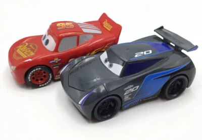 Disney Cars 3 Lightning McQueen Jackson Storm IGNTR 2.0 Presiona Push Down & Go Foto 1 de 4
