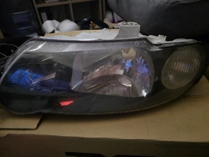 TYC Pair LH+RH Head Light Black Tear Drop For Holden Commodore VX VU SS 00-02 - Picture 1 of 3