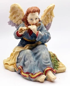 Estatuilla flauta ángel resina 4,5" de colección International Resourcing Services Navidad - Imagen 1 de 8