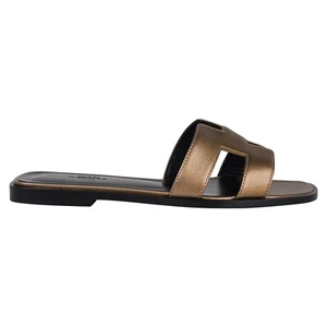 Sandalia Hermes Plana Oran Vert Bronce Caja Epsom 36.5 / 6.5 Nueva con Caja - Imagen 1 de 7