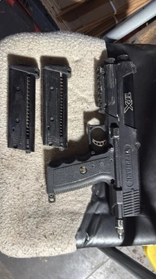 Marcador de paintball pistola calibre 68 Tippmann TPX Foto 1 de 2