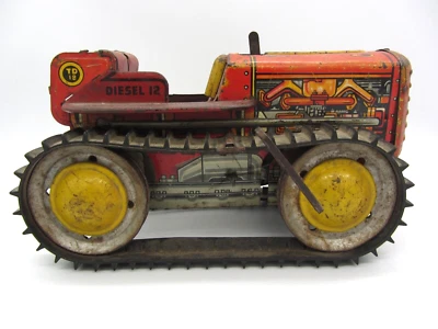 Tractor vintage Marx Td 18 cuerda estaño diésel 12 con banda de rodadura ¡no funciona! Foto 1 de 4