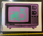 Armando Chainsawhands - S&N Light Purple TV W/ Teal Hand Inside Street Art