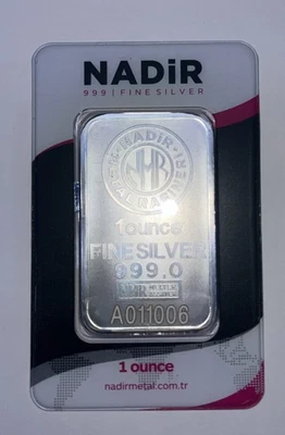 NADIR METAL REFINER BARRA DE PLATA FINA .999 DE UNA ONZA EN TARJETA DE ENSAYO SIN ABRIR Foto 1 de 2