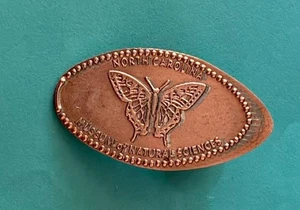 MARIPOSA MUSEO DE CAROLINA DEL NORTE CIENCIAS NATURALES PENIQUE PRENSADO ALARGADO RETIRADO - Imagen 1 de 1