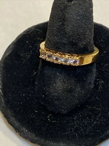 GOLD TONE METAL CZ PETITE ETERNITY PRONGED SET BAND RING SIZE 8 - Picture 1 of 12