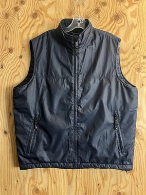 Chaleco acolchado de colección CC Filson peso pluma cremallera completa azul marino para hombre L/pestañas de cuero Foto 1 de 4