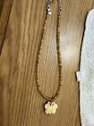 Vintage Amber colored glass beaded necklace with butterfly pendant