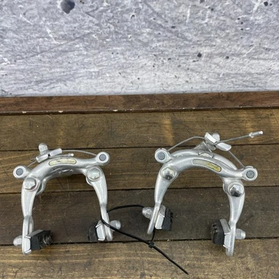 Juego de pinzas de freno de bicicleta de carretera Dia-Compe 5583 750 vintage par de tracción central Japón Foto 1 de 4