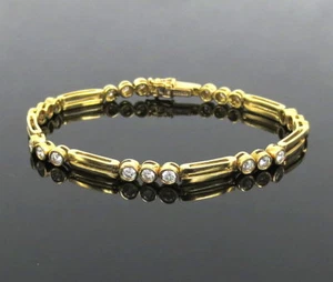 Brazalete de tenis Gerard 1,50 quilates DE VS corte perfecto oro amarillo 18 quilates - Imagen 1 de 10