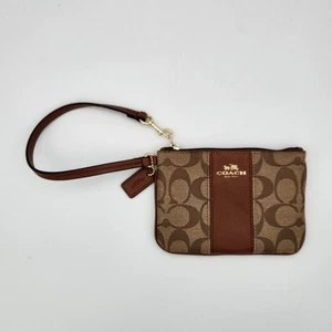 Polsino Coach con zip angolare in tela rivestita firmata marrone con righe - Foto 1 di 6