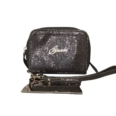 Cartera pulsera Guess negra brillante doble cremallera porta tarjetas para monedas usada en excelente estado Foto 1 de 4