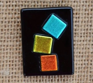 Cuadrados metálicos metálicos de vidrio negro fundido diacroico ''PIN'' verde azulado, dorado, naranja - Imagen 1 de 3
