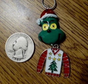 Maglione Grinch brutto fatto a mano che ha rubato ornamento natalizio Nora's USA - Foto 1 di 6
