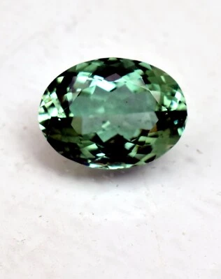 Natural Mozambique Green Tourmaline 7.15  Ct Oval Cut Loose Gemstone TREATED - Image 1 of 4