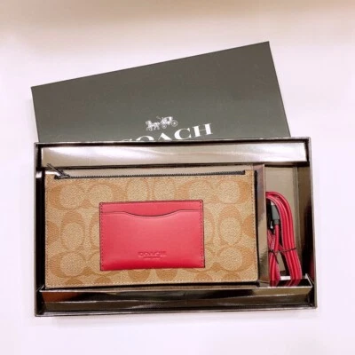 Cartera de teléfono COACH en caja con cremallera con cable USB de cuero para iPhone/iPad F79849 nueva con etiquetas Foto 1 de 4